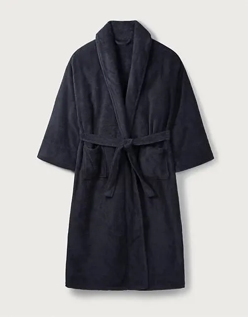 Navy towelling dressing gown with a shawl collar, patch pockets and tie belt