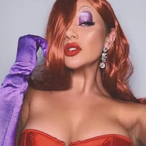 Jessica Rabbit inspired look with red waves, purple eyeshadow, red lips and satin opera gloves